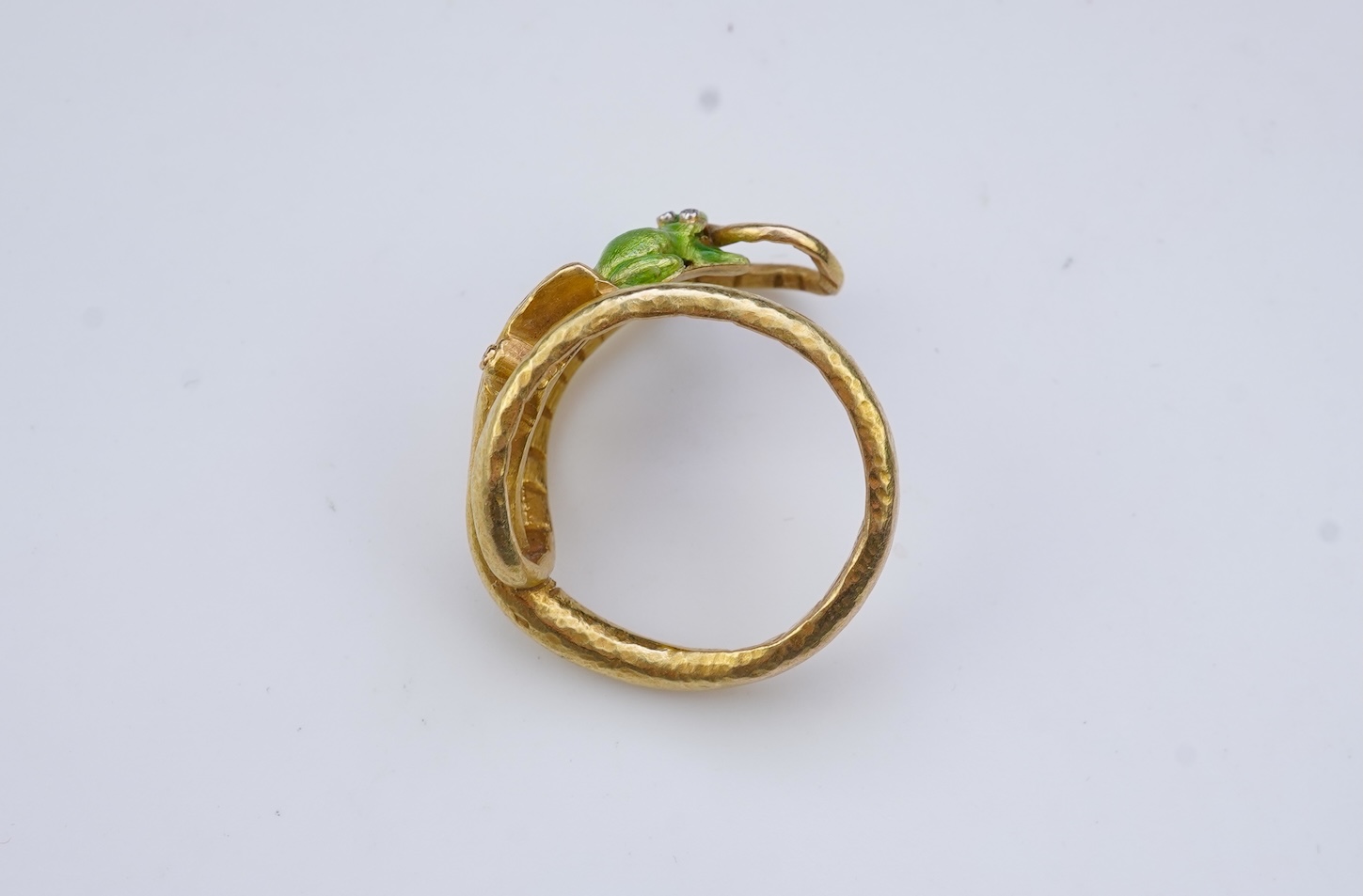An unusual gold and enamel novelty ring